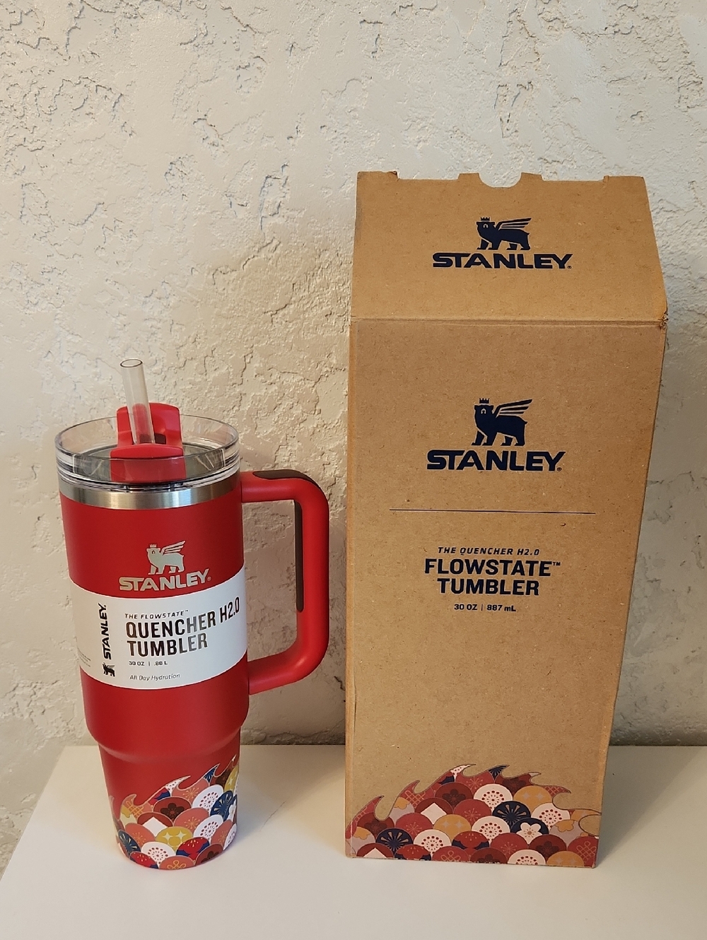 Stanley Red Tumbler with Multicolor Patterned Base